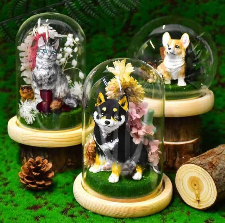 Custom pet plaster sculpture diorama style with multiple pets under glass dome