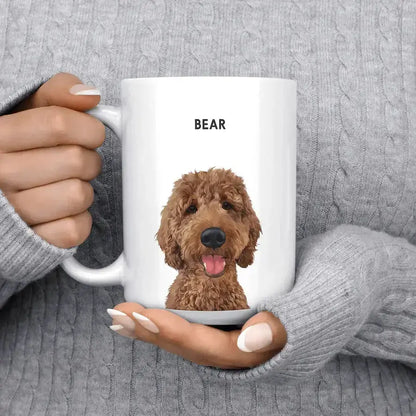 Personalized white ceramic mug with a custom pet portrait of a brown curly-haired dog and the name 'Bear' printed above.