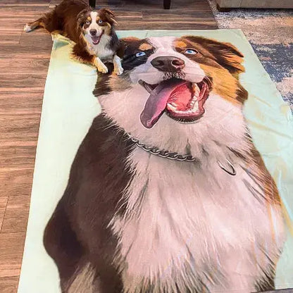 Custom pet blanket by Paw-Pixie with a large printed portrait of a brown and white dog, displayed next to the real dog.