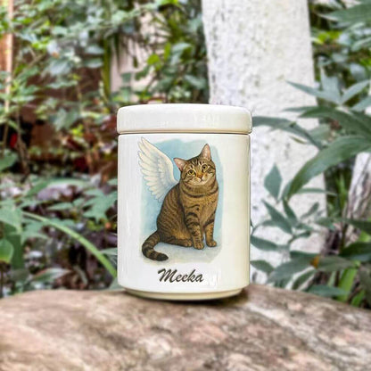 Outdoor photo of Custom Pet Urn with engraved portrait, durable memorial keepsake for pets — by Paw-Pixie